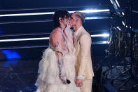 <p>SANREMO, ITALY - MARCH 05: Achille Lauro and Boss Doms kiss on stage during the 71th Sanremo Music Festival 2021 at Teatro Ariston on March 05, 2021 in Sanremo, Italy. (Photo by Jacopo Raule / Daniele Venturelli/Getty Images)</p> 