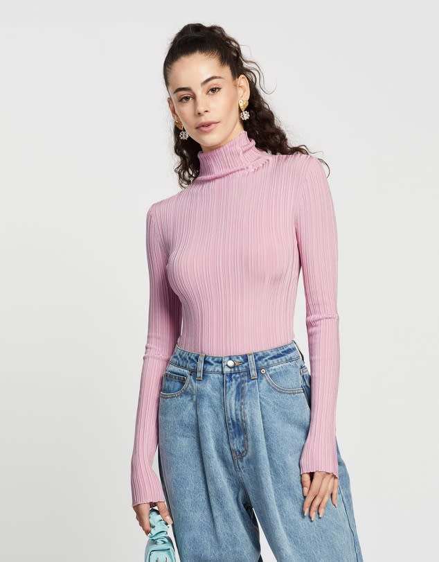 This pink turtle neck is down to $35.99 from $59.99. Photo: The Iconic