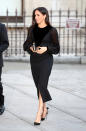 <p>Meghan Markle opened ‘Oceania’ at Royal Academy of Arts on September 25, marking her first solo outing since becoming a royal. For the occassion, the Duchess wore a two-tone, sheer black Givenchy dress with billowing sleeves and her favourite Aquazzura heels. <em>[Photo: Getty]</em> </p>