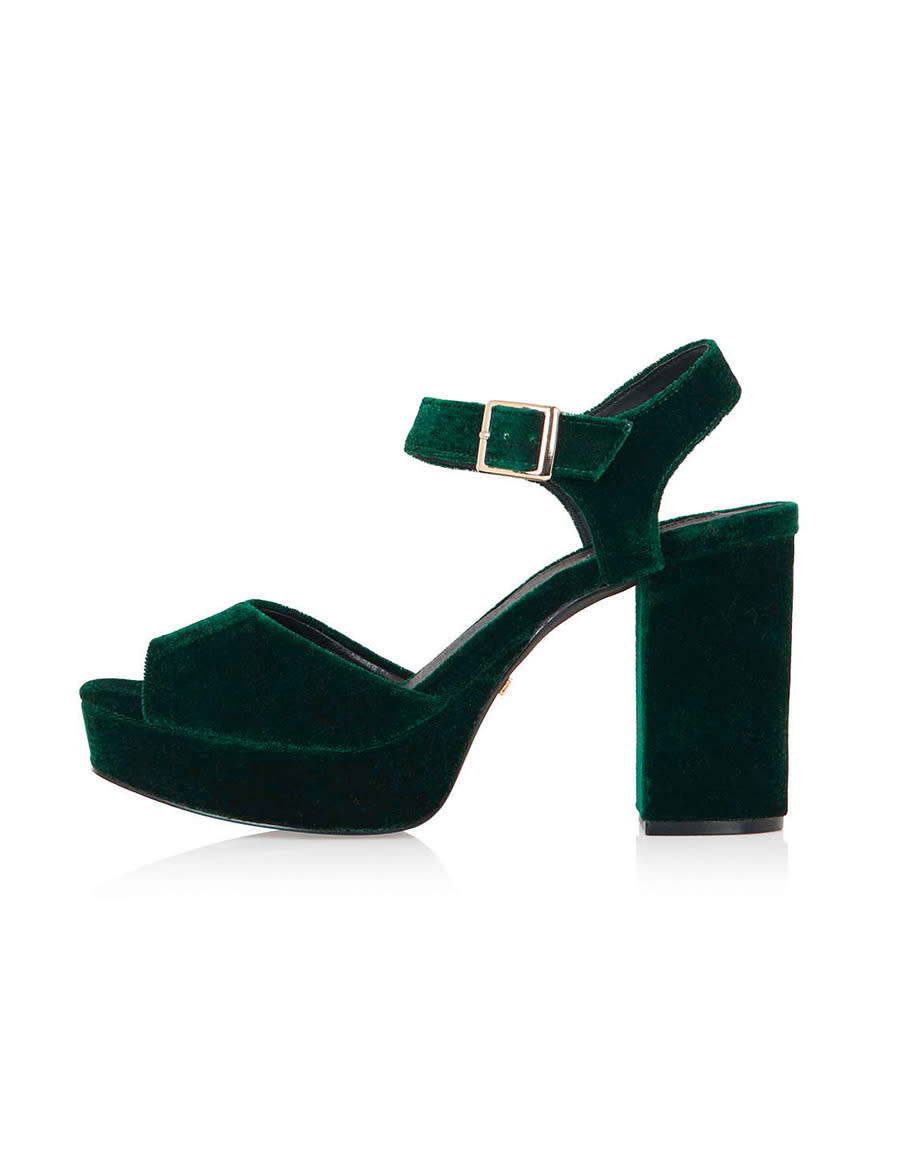 Forest green velvet lends a rich, holiday vibe to ‘70s-style platforms.