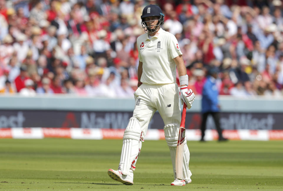 England's captain Joe Root leaves the pitch after he is bowled for lbw by Australia's Josh Hazlewood during the second day of the second Ashes test match between England and Australia at Lord's cricket ground in London, Thursday, Aug. 15, 2019. (AP Photo/Frank Augstein)