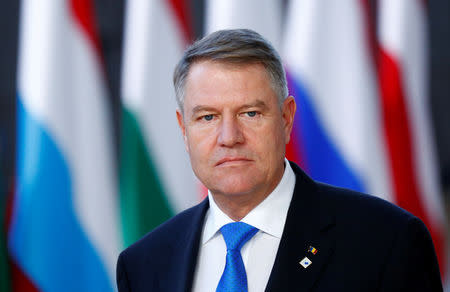 FILE PHOTO: Romanian President Klaus Iohannis arrives at a European Union leaders summit in Brussels, Belgium December 13, 2018. REUTERS/Francois Lenoir/File Photo