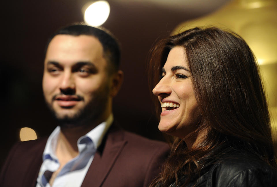 Jehane Noujaim, right, director of the Oscar-nominated documentary film "The Square," poses with the film's producer Karim Amer at a reception featuring the Oscar nominees in the Documentary Feature and Documentary Short Subject categories on Wednesday, Feb. 26, 2014, in Beverly Hills, Calif. The Oscars will be held on Sunday at the Dolby Theatre in Los Angeles. (Photo by Chris Pizzello/Invision/AP)