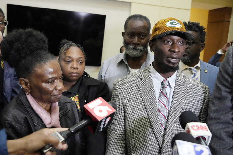 Michael Corey Jenkins, who with his friend Eddie Terrell Parker, unseen, were victims of racially motivated torture by six former Mississippi law enforcement officers, speaks to reporters following the sentencing in state court of the former lawmen for their roles in the 2023 assault, Wednesday, April 10, 2024, in Brandon, Miss. Rankin County Circuit Judge Steve Ratcliff gave the six former Mississippi law enforcement officers yearslong state sentences that were shorter than the amount of time in federal prison that they had already received. Time served for the state convictions will run concurrently, or at the same time, as the federal sentences, and the men will serve their time in federal penitentiaries. (AP Photo/Rogelio V. Solis)