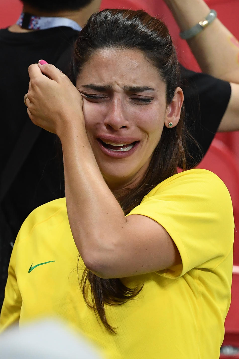 <p>A Brazil fan react to their loss during the Russia 2018 World Cup quarter-final football match between Brazil and Belgium at the Kazan Arena in Kazan on July 6, 2018. – Belgium beat World Cup favourites Brazil 2-1 on Friday to set up a semi-final against France in Saint Petersburg. (Photo by Jewel SAMAD / AFP) </p>