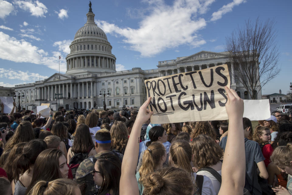 FILE - School students from Montgomery County, Md., in suburban Washington, rally in solidarity with those affected by the shooting at Parkland High School in Florida, at the Capitol in Washington, Wednesday, Feb. 21, 2018. (AP Photo/J. Scott Applewhite, File)