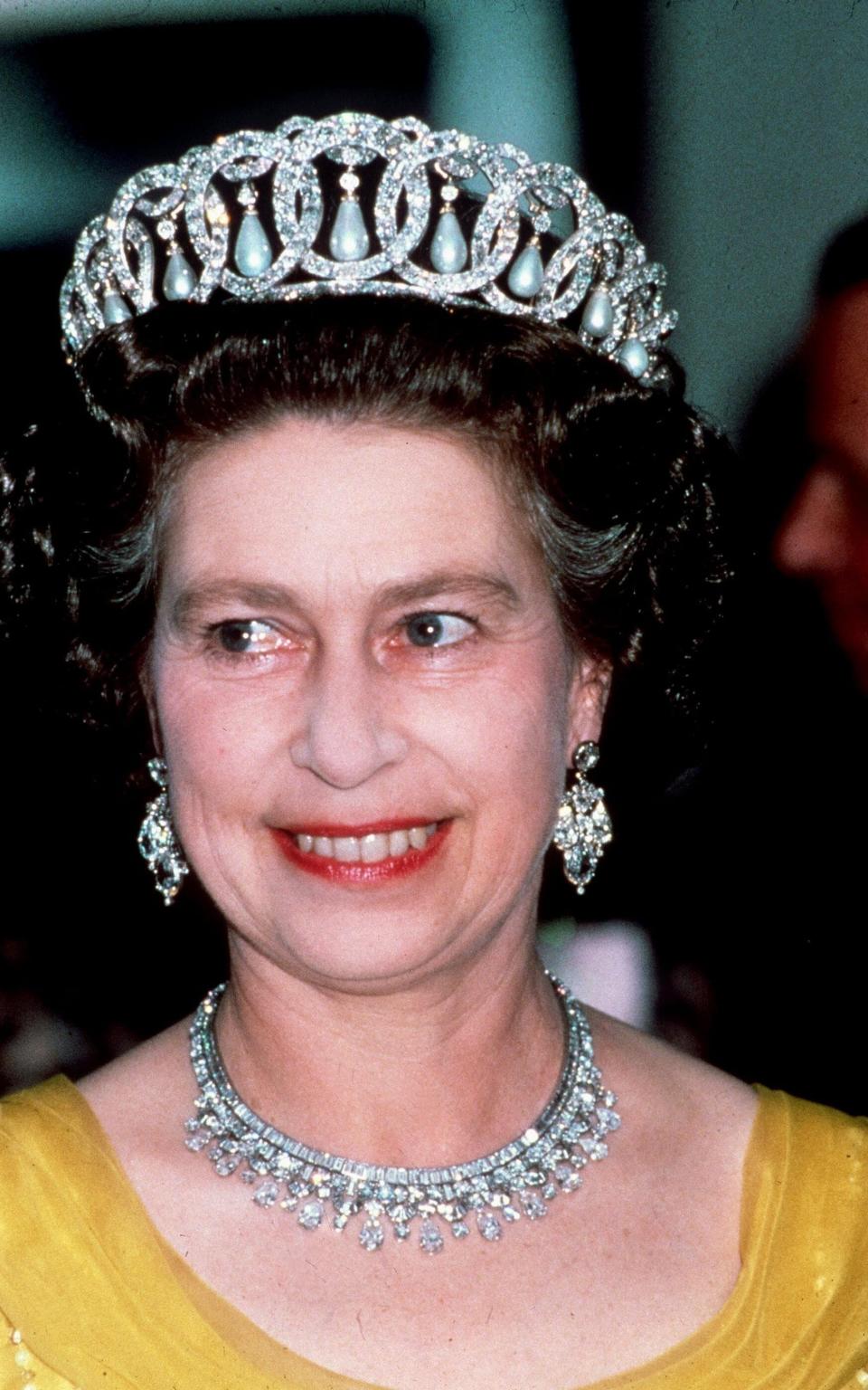 The Queen wears the Grand Duchess Vladimir tiara - Rex Features