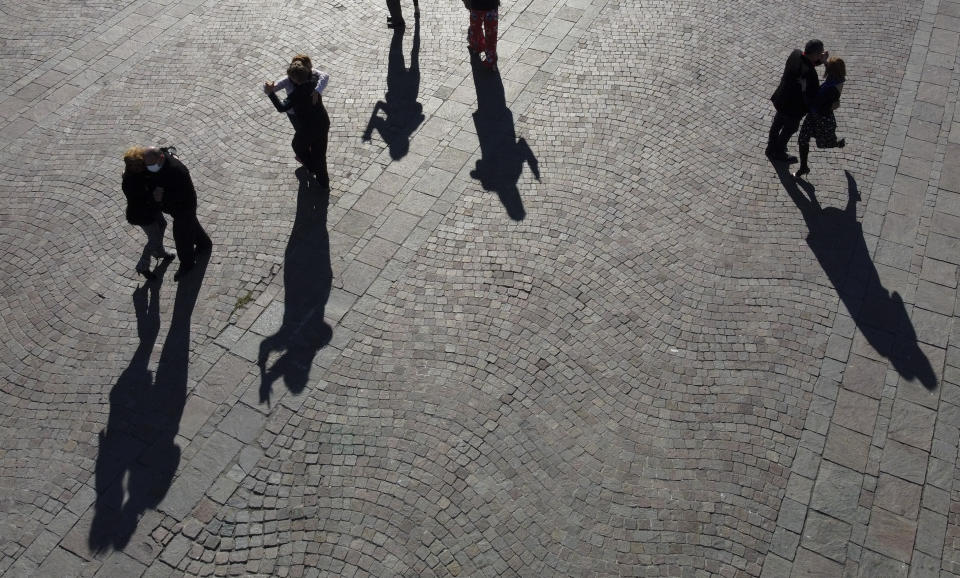 Couples dance tango in protest to demand to be allowed to dance in open spaces during the COVID-19 pandemic lockdown in Buenos Aires, Argentina, Saturday, May 29, 2021. Argentine authorities have decreed a strict quarantine in hopes of reducing the spread of COVID-19. (AP Photo/Natacha Pisarenko)