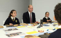 Britain's Prince William joins local school children from St Cuthbert with St Matthias CE Primary School at a copper beating workshop during the official opening of Japan House in London, Britain, September 13, 2018. Tim P. Whitby/Pool via REUTERS