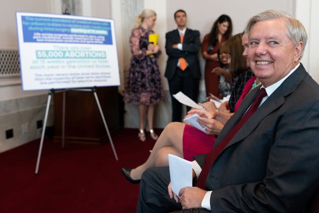 Sen. Lindsey Graham (R-S.C.) smiles before speaking during his news conference on Capitol Hill to announce a national bill on abortion restrictions on Tuesday. (Photo: Bill Clark via Getty Images)