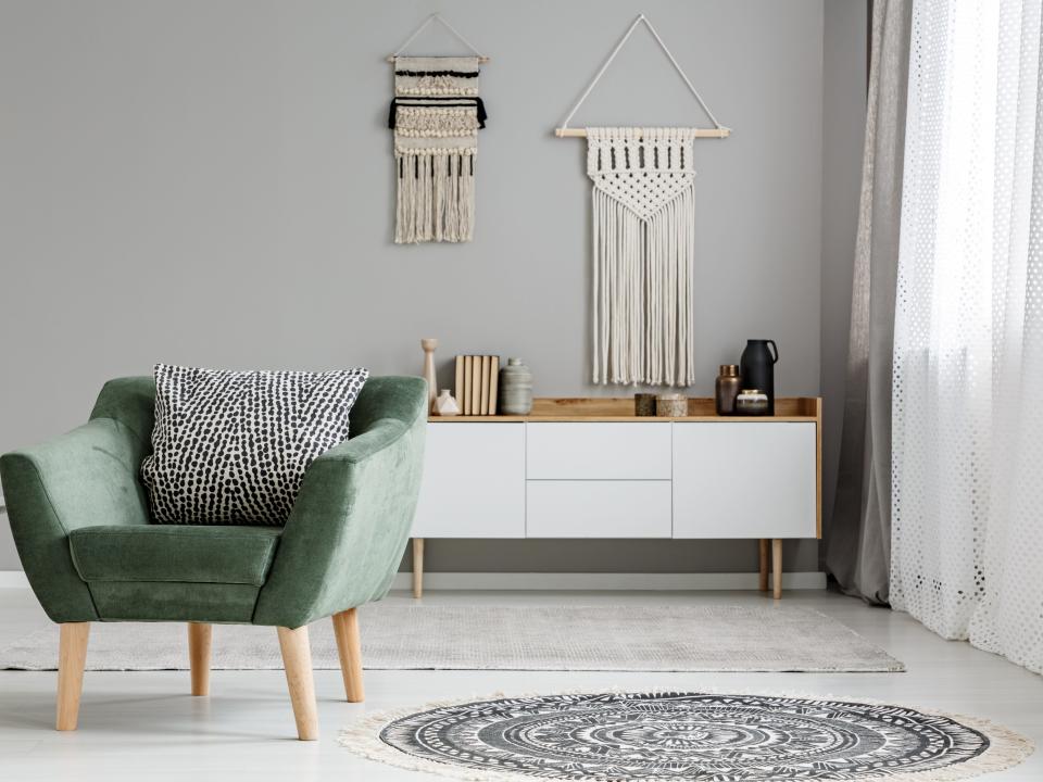 macramé hanging on wall in back of living room