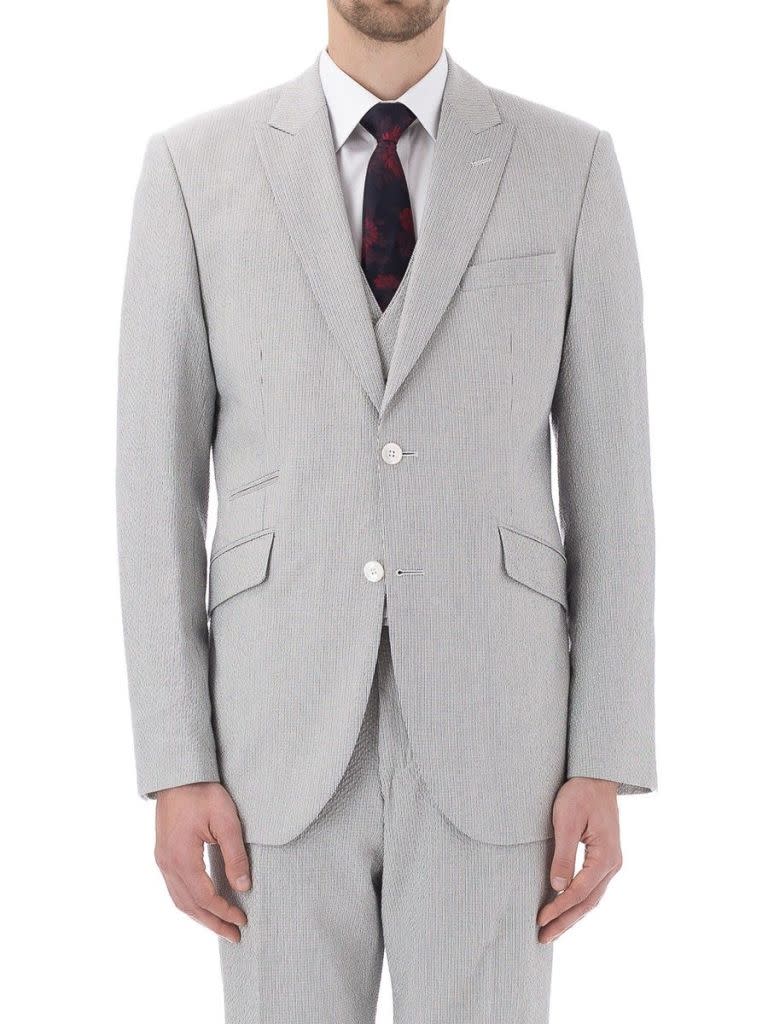 <p>You might have thought Oliver Spencer's formal wear brand only made formal wear (fair enough), but that simply isn't true, as this excellent seersucker blazer (trousers available) proves. </p><p><a rel="nofollow noopener" href="https://favourbrook.com/ecru-navy-langham-buckingham-jacket" target="_blank" data-ylk="slk:£245;elm:context_link;itc:0;sec:content-canvas" class="link ">£245</a></p>