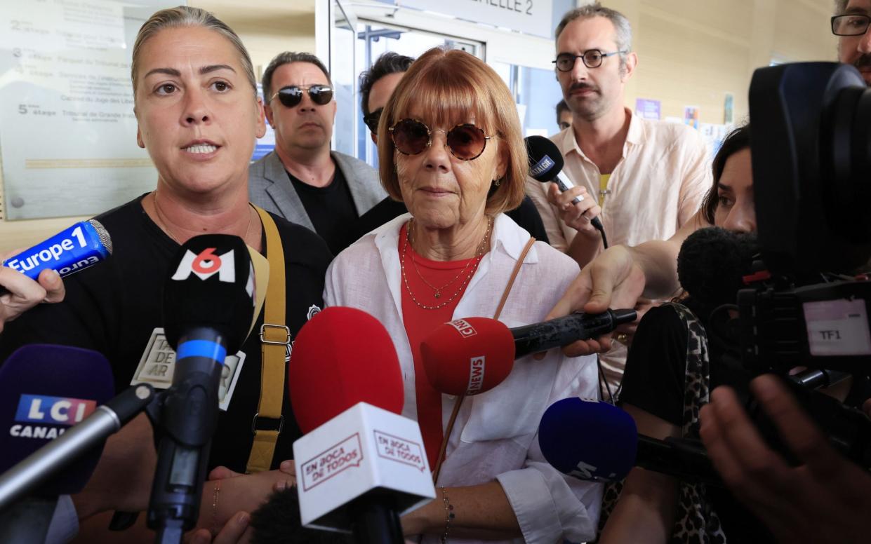 Gisèle Pélicot (pictured centre), and her daughter Caroline Darian (left) speak with the media after leaving the criminal court in Avignon, France