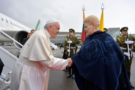 Lithuanian President Dalya Grybauskaite welcomes Pope Francis in Vilnius, Lithuania, September 22, 2018. Vatican Media/Handout via REUTERS