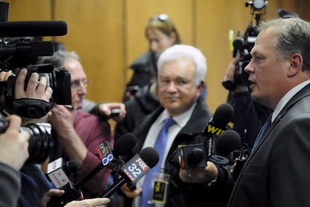 Kalamazoo County Prosecutor Jeff Getting (R) speaks with reporters after the arraignment of Jason Dalton (not shown) in Kalamazoo County, Michigan, February 22, 2016. REUTERS/Mark Kauzlarich