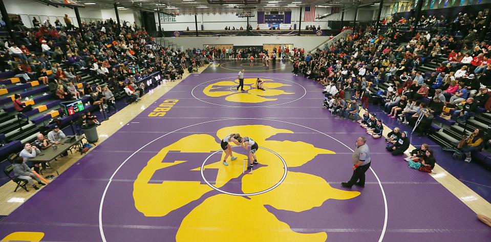 Iowa High School girls wrestlers compete in the Central Iowa Kickoff Girls Wrestling Tournament at the Nevada High School Field House on Saturday, Nov. 18, 2023, in Nevada, Iowa. The tournament featured 34 scored teams and over 400 wrestlers.