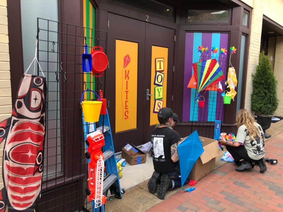 Set dressers design a kite and toy store in downtown Hopewell possibly for a Pharrell Williams musical about the Virginia Beach native's life.