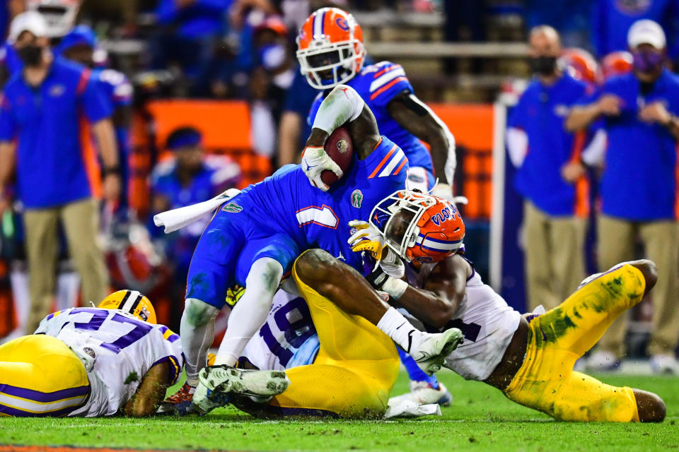 GAINESVILLE, FL - DECEMBER 12: Eli Ricks #1 of the LSU Tigers makes a tackle against the Florida Gators at Ben Hill Griffin Stadium on December 12, 2020 in Gainesville, Florida. (Photo by Gus Stark/Collegiate Images/Getty Images)