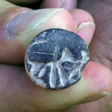 A seal unearthed at Beth Shemesh, Israel, seems to depict a man fighting a lion.