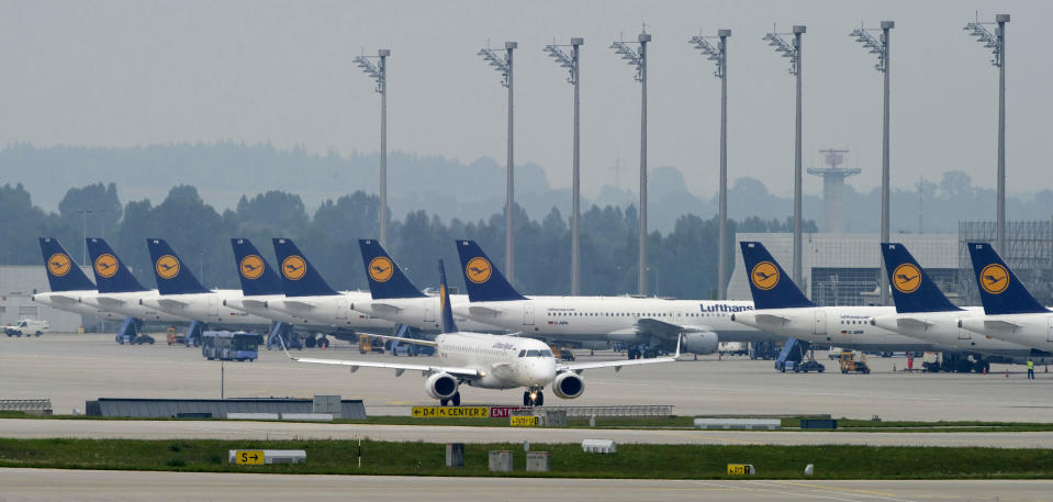 Planes of Germany's Lufthansa airline are parked at the airport in Munich, southern Germany, Tuesday, Sept. 4, 2012, during a strike of Lufthansa flight attendants. UFO, the union for the cabin crews, is seeking a 5 percent pay raise for the airline's more than 18,000 cabin crew workers. Lufthansa has said it is offering a 3.5 percent raise. (AP Photo/dapd, Lukas Barth)