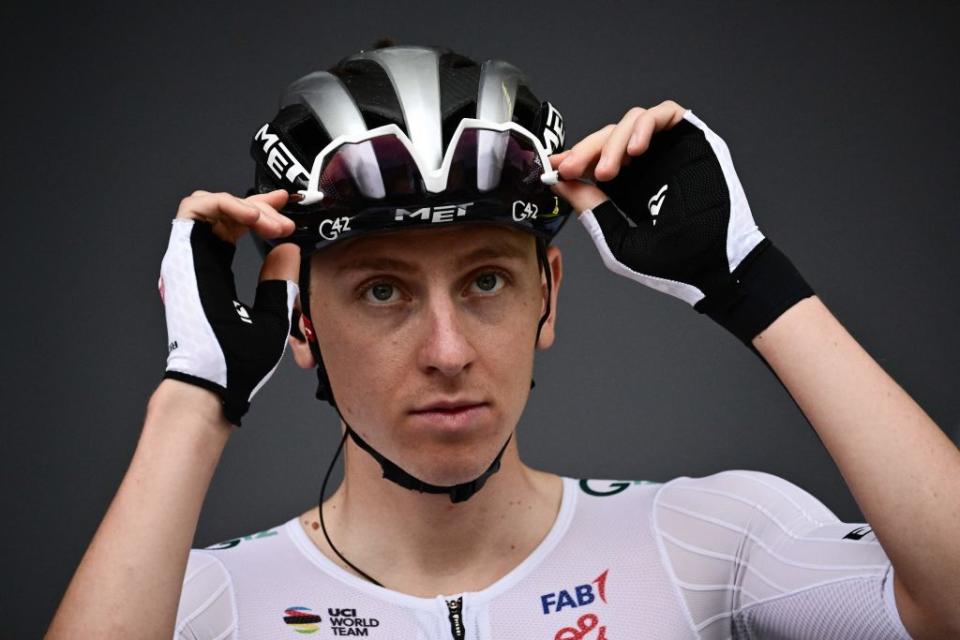 UAE Team Emirates Slovenian rider Tadej Pogacar adjusts his glasses as he awaits the start of the 1st stage of the 110th edition of the Tour de France cycling race 182 km departing and finishing in Bilbao in northern Spain on July 1 2023 Photo by Marco BERTORELLO  AFP Photo by MARCO BERTORELLOAFP via Getty Images