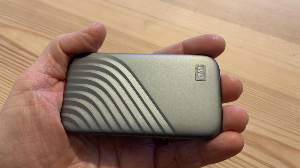 WD My Passport SSD held in a hand