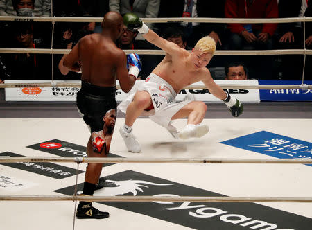 Boxing - Floyd Mayweather v Tenshin Nasukawa - Saitama Super Arena, Tokyo, Japan - December 31, 2018 Floyd Mayweather knocks down Tenshin Nasukawa in the first round REUTERS/Issei Kato