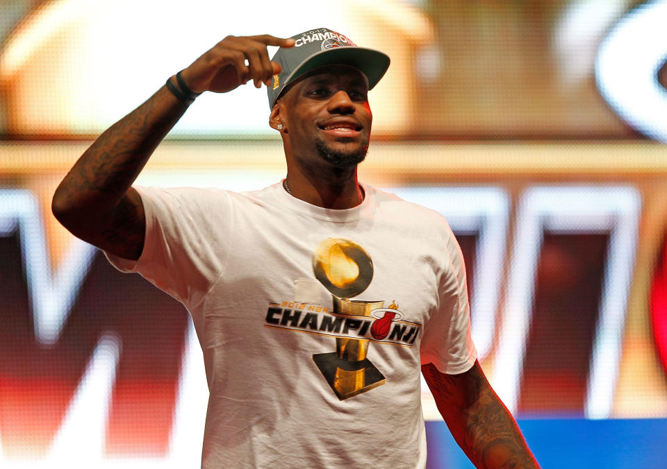 MIAMI, FL - JUNE 25: LeBron James #6 of the Miami Heat celebrates during a rally for the 2012 NBA Champion Miami Heat at American Airlines Arena on June 25, 2012 in Miami, Florida. (Photo by Mike Ehrmann/Getty Images)