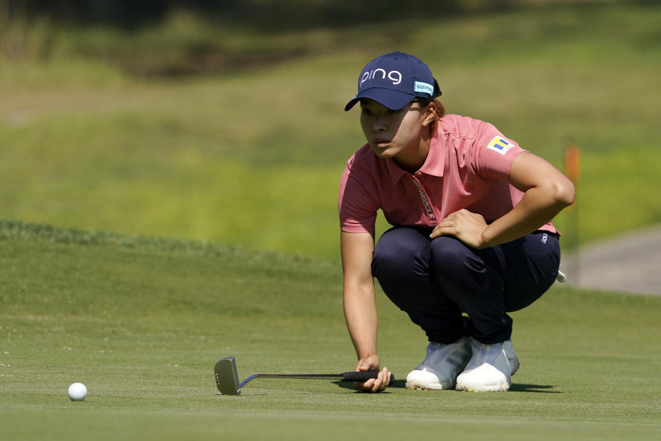 Hinako Shibuno, of Japan, lines up a putt on the eighth hole during the first round of the MEDIHEAL Championship golf tournament Thursday, Oct. 6, 2022, in Somis, Calif. (AP Photo/Mark J. Terrill)