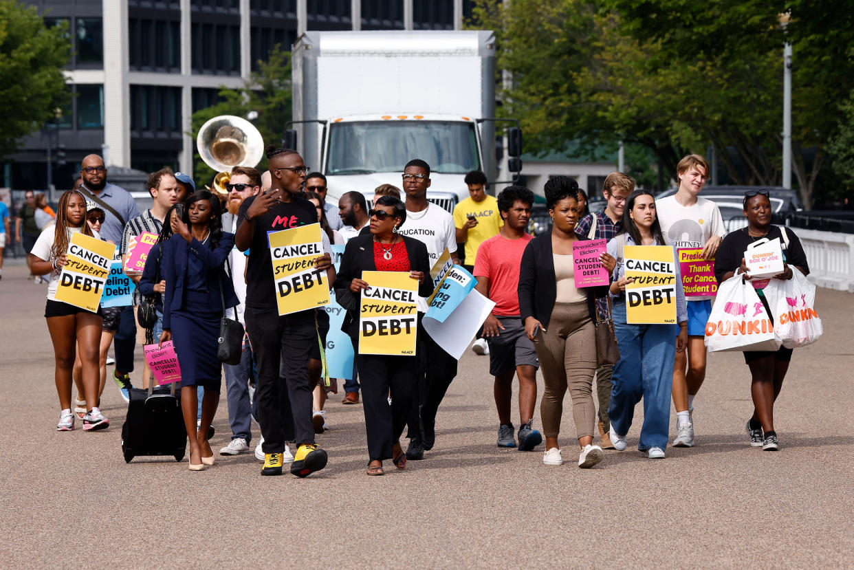 Student loan borrowers stage a rally in front of The White House to celebrate President Biden cancelling student debt