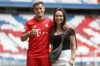 MUNICH, GERMANY - AUGUST 19: Newly signed Player of FC Bayern Muenchen Philippe Coutinho (L) and his wife Aine Coutinho (R) pose for a picture during his official presentation at Allianz Arena on August 19, 2019 in Munich, Germany. (Photo by Alexander Hassenstein/Bongarts/Getty Images)