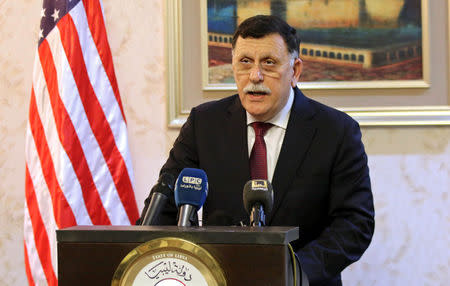 Prime Minister of Libya's Government of National Accord (GNA) Fayez Seraj attends a news conference with the U.S. ambassador to Libya Peter Bodde and Marine General Thomas Waldhauser, the top U.S. military commander overseeing troops in Africa, in Tripoli, Libya May 23, 2017. REUTERS/Hani Amara