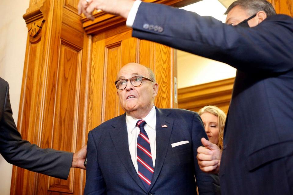 PHOTO: Rudy Giuliani walks to a senate hearing at the Georgia State Capitol, Dec. 3, 2020, in Atlanta. (Rebecca Wright/AP)