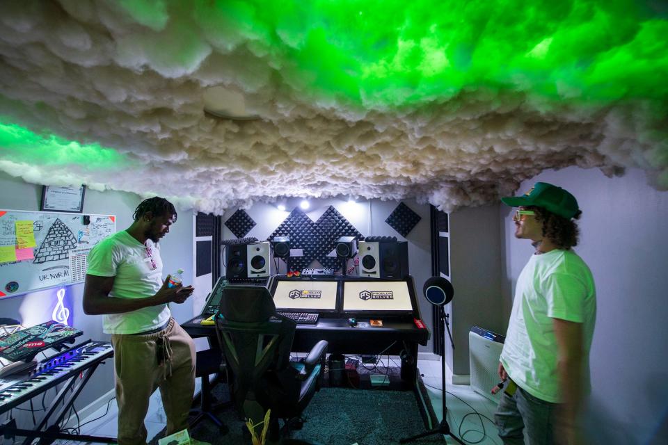 From the left, client Polomann Solo and co-owner Off-White Sheddy (Trevor Downs) work inside the Cloud Room at Problem Solver Studios in West York.