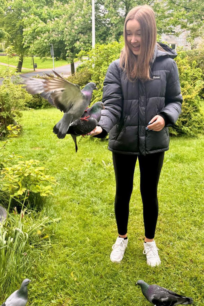 Girl with pigeons