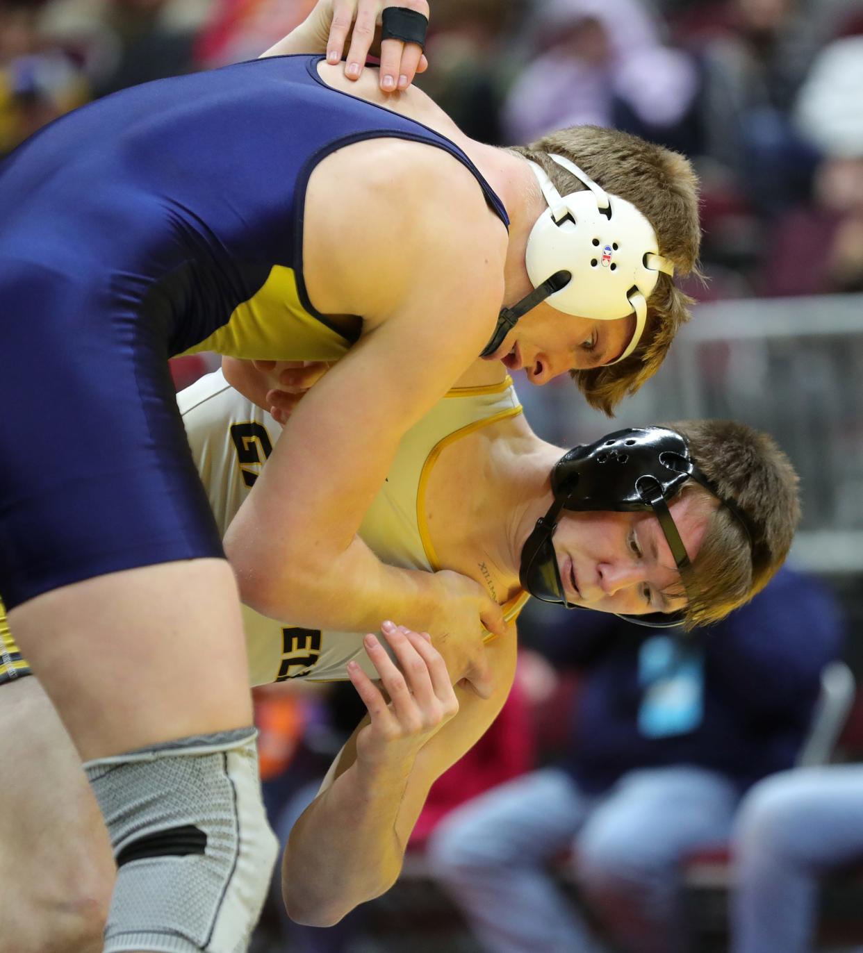 Garrettsville Garfield's Keegan Sell, right, continued his trek toward the top of the rankings with a Brecksville Holiday Tournament title.