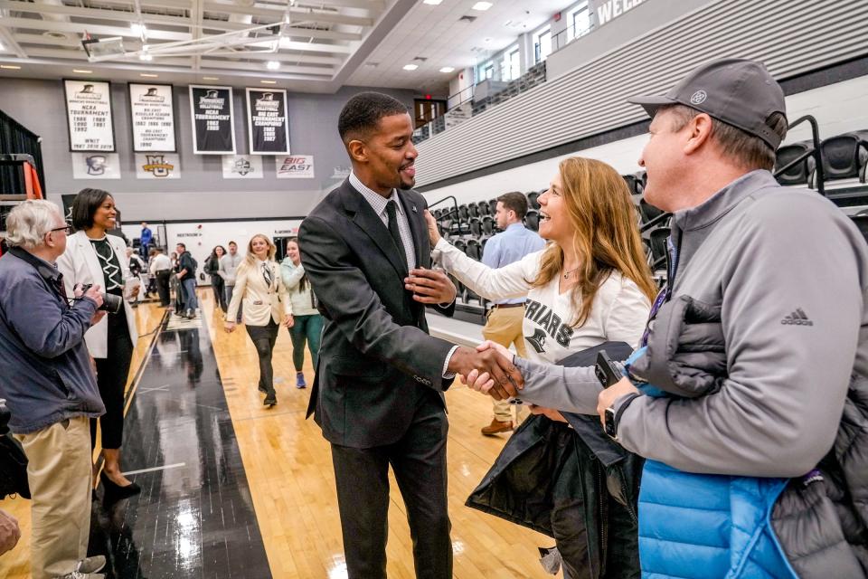 New men's basketball coach Kim English meets some Providence fans after Wednesday's introduction ceremony.