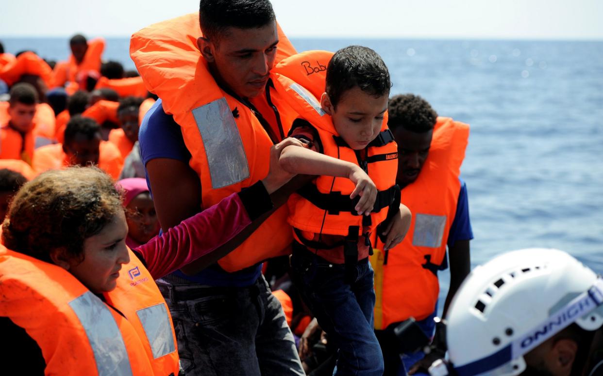 Migrants are rescued by SOS Mediterranee organisation and Doctors Without Borders during a search and rescue (SAR) operation with the MV Aquarius rescue ship in the Mediterranean Sea, off the Libyan Coast, August 10  - Reuters