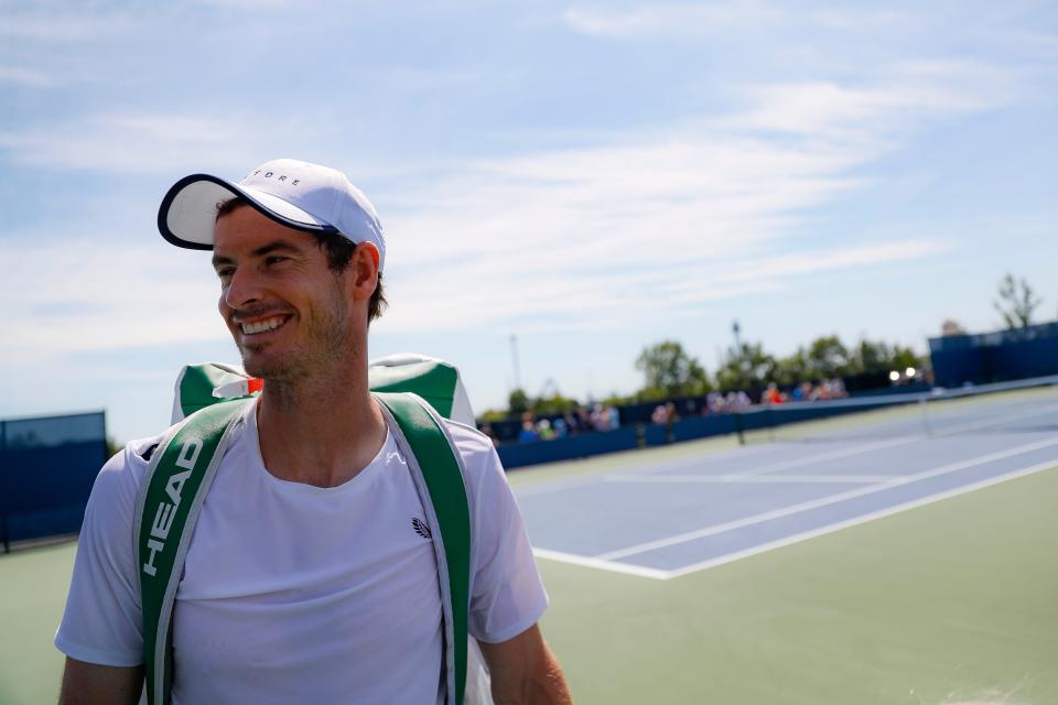 Andy Murray, of Britain, smiles after practice at the Western & Southern Open tennis tournament, Sunday, Sunday, Aug. 11, 2019, in Mason, Ohio. (AP Photo/John Minchillo)