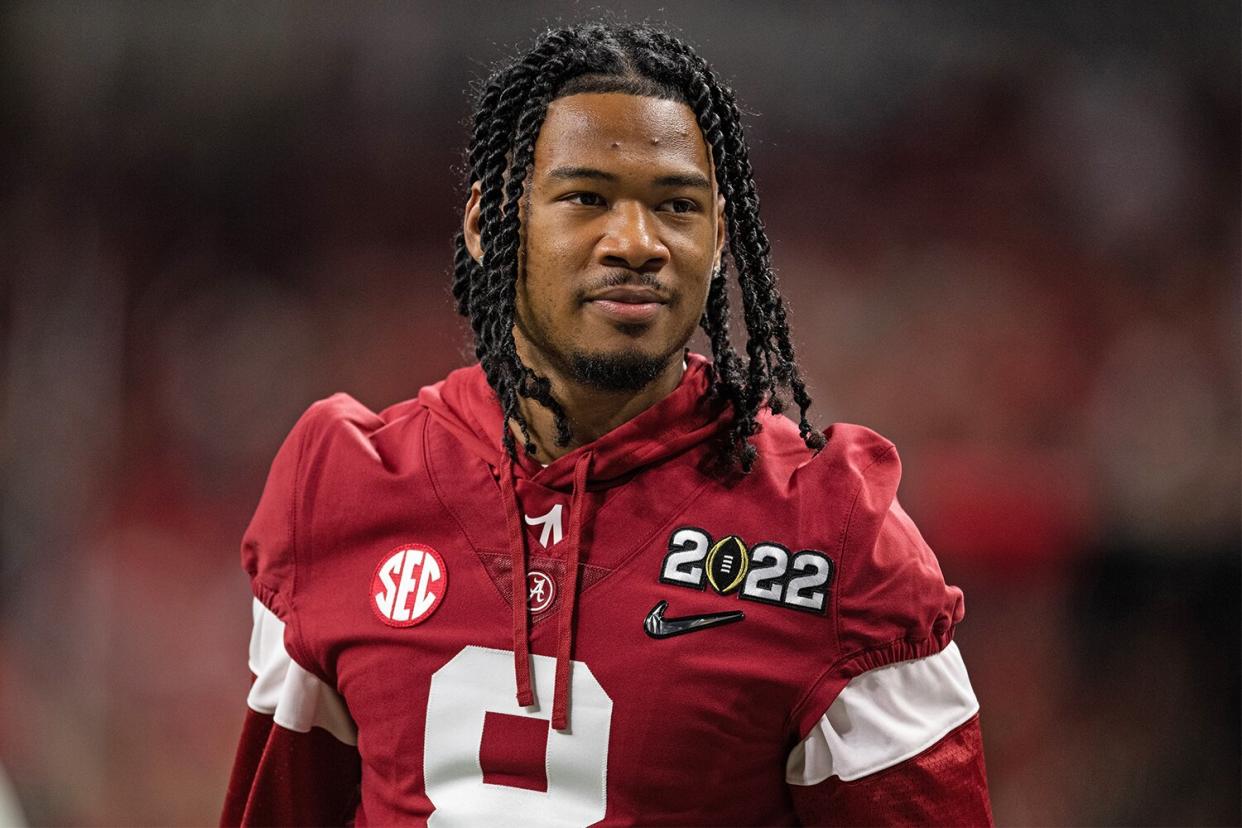 Alabama Crimson Tide WR John Metchie III (8) stands on the field before the Alabama Crimson Tide versus the Georgia Bulldogs in the College Football Playoff National Championship, on January 10, 2022, at Lucas Oil Stadium in Indianapolis, IN.