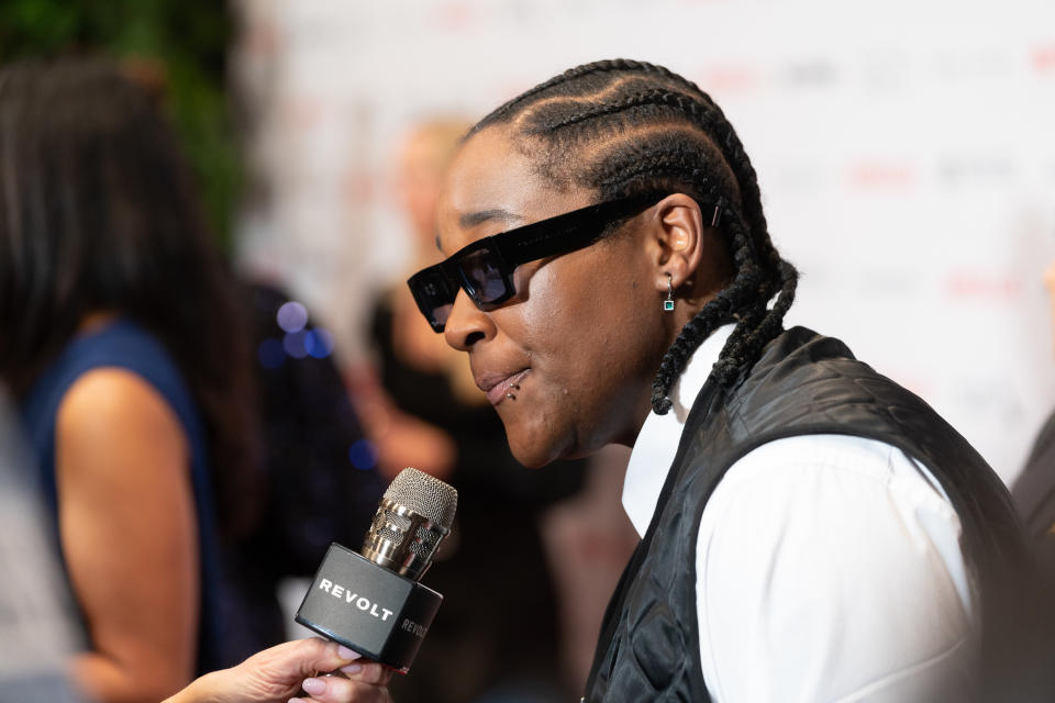 A close-up of Jozzy being interviewed on the red carpet