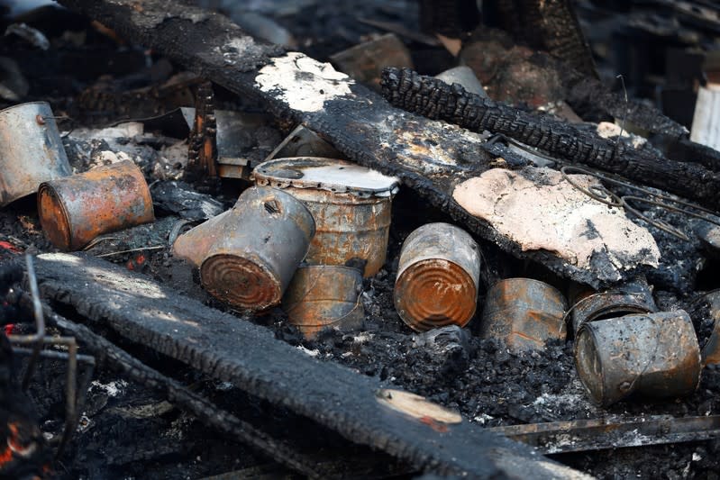 Containers burnt by the Kincade Fire are seen at Fieldstone Farm in Santa Rosa, California