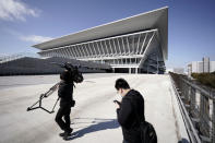 Tokyo Aquatics Center is seen after a grand opening ceremony Saturday, Oct. 24, 2020, in Tokyo. The Tokyo 2020 organizing committee held the grand opening ceremony Saturday at the aquatics center, planned to host Olympic artistic swimming, diving and swimming and Paralympics swimming events in 2021. (AP Photo/Eugene Hoshiko)