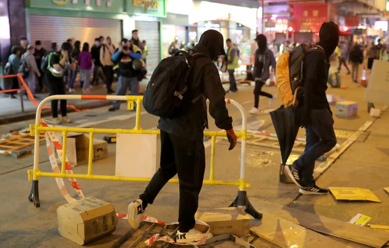 Anti-government protesters rally outside Prince Edward MTR station in Hong Kong