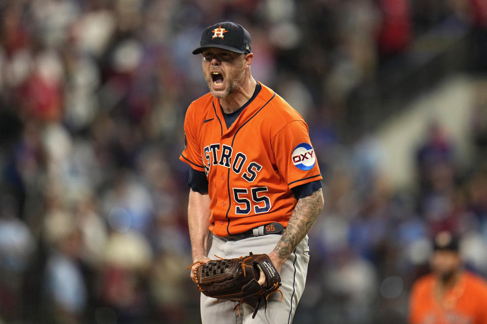 Houston Astros relief pitcher Ryan Pressly reacts after the final out during the ninth inning in Game 5 of the baseball American League Championship Series against the Texas Rangers Friday, Oct. 20, 2023, in Arlington, Texas. The Astros won 5-4. (AP Photo/Julio Cortez)