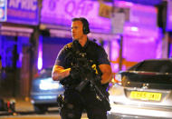 <p>An armed police officer attends to the scene after a vehicle collided with pedestrians in the Finsbury Park neighborhood of North London, Britain June 19, 2017. (Neil Hall/Reuters) </p>