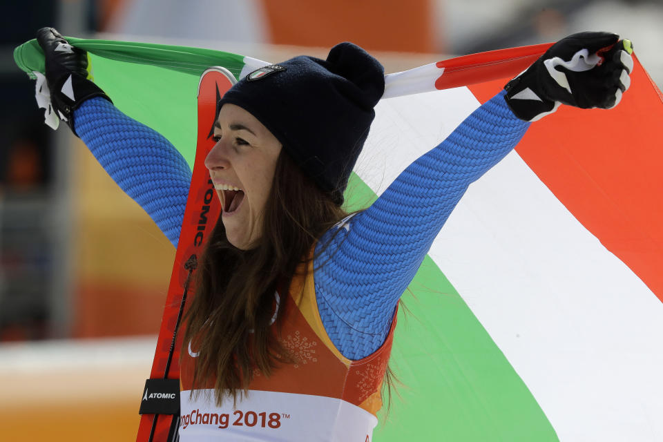 <p>Italy’s Sofia Goggia celebrates after winning gold in the women’s downhill at the 2018 Winter Olympics in Jeongseon, South Korea, Wednesday, Feb. 21, 2018. (AP Photo/Michael Probst) </p>