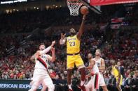 Oct 18, 2018; Portland, OR, USA; Los Angeles Lakers forward LeBron James (23) shoots over Portland Trail Blazers center Jusuf Nurkic (27) in the first half at Moda Center. Mandatory Credit: Jaime Valdez-USA TODAY Sports