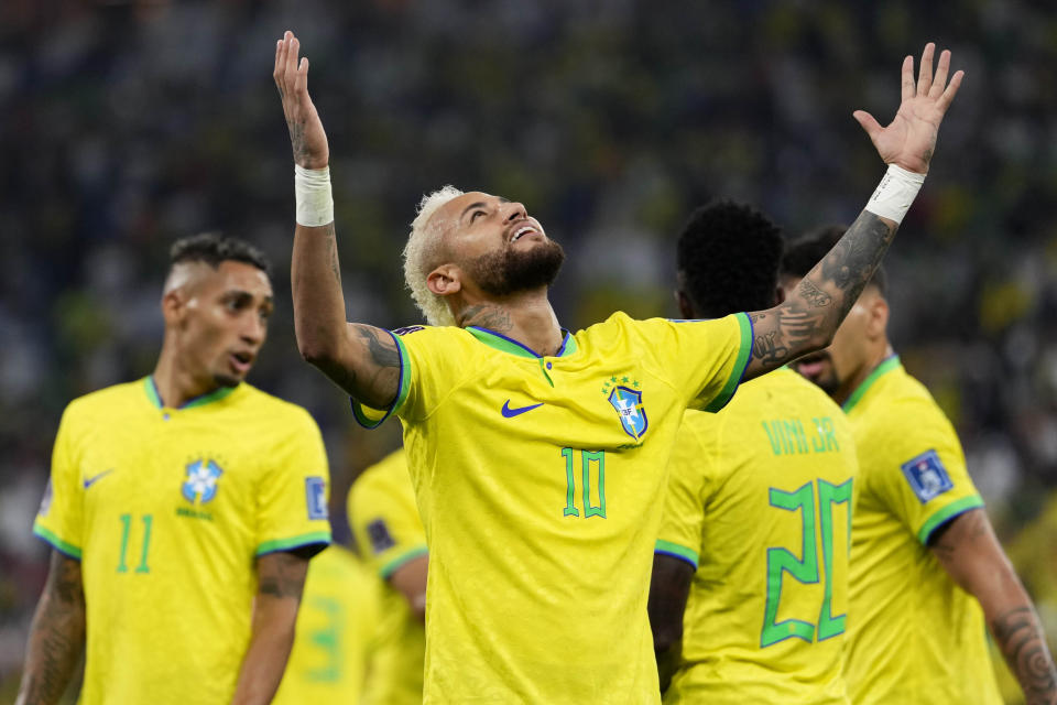 Brazil's Neymar celebrates after scoring his side's second goal during the World Cup round of 16 soccer match between Brazil and South Korea, at the Education City Stadium in Al Rayyan, Qatar, Monday, Dec. 5, 2022. (AP Photo/Manu Fernandez)