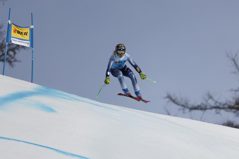 Italy's Federica Brignone speeds down the course during an alpine ski, women's World Cup super-G, in Crans Montana, Switzerland, Sunday, Feb. 18, 2024. (AP Photo/Giovanni Maria Pizzato)